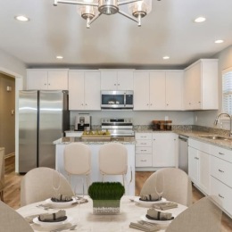 kitchen and dining room with table and chairs