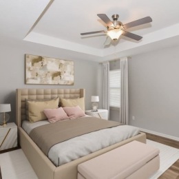 bedroom with bed lamps ceiling fan and large windows