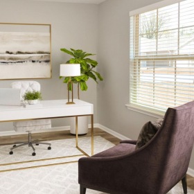 a room with a table and chairs