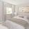 	Rental Homes in Belton, MO - Elm Grove - Bedroom with Luxury Vinyl Plank Flooring, Window, Large Bed, Two Nightstands with Lamps, and Stylish Decor