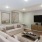 a living room with a tv and couches