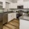 a kitchen with white cabinets