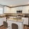a kitchen with white cabinets